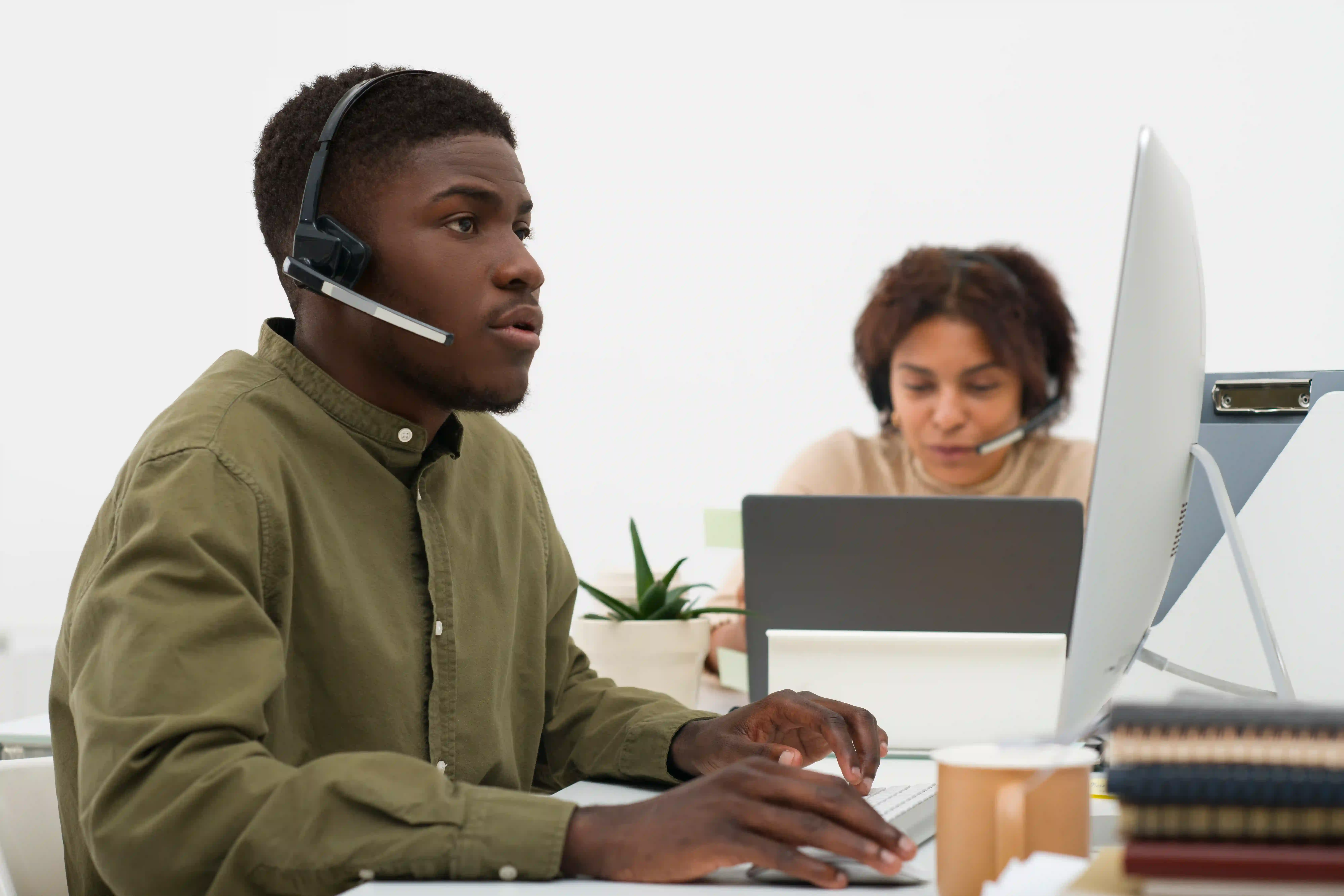 IT support professionals assisting a client